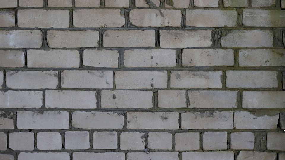 Szilikát téglából készült fal, amelyen láthatóak a fugák és a tégla textúrája.